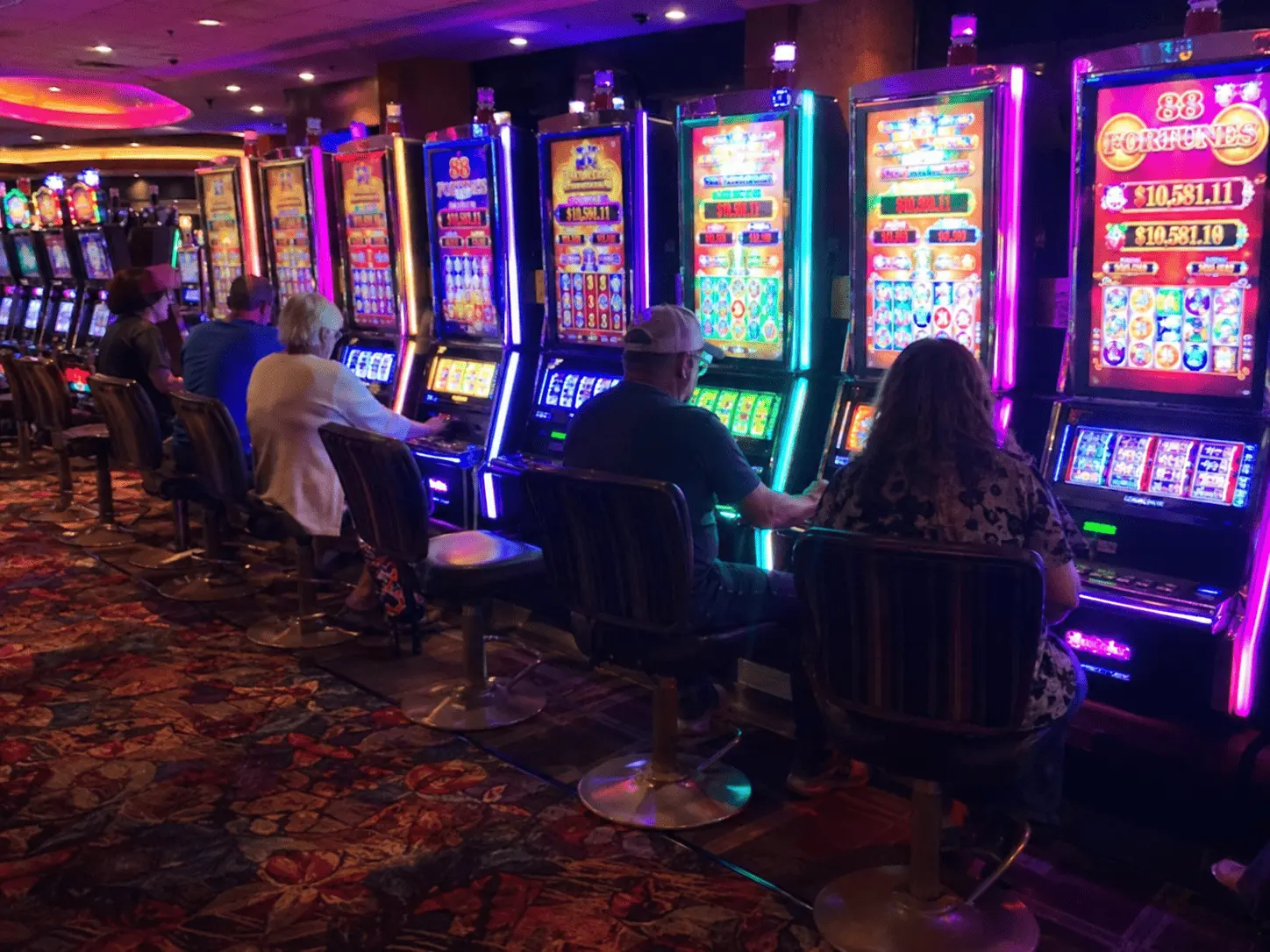 A player steps away from the laptop after requesting a small test withdrawal instead of chasing speed.